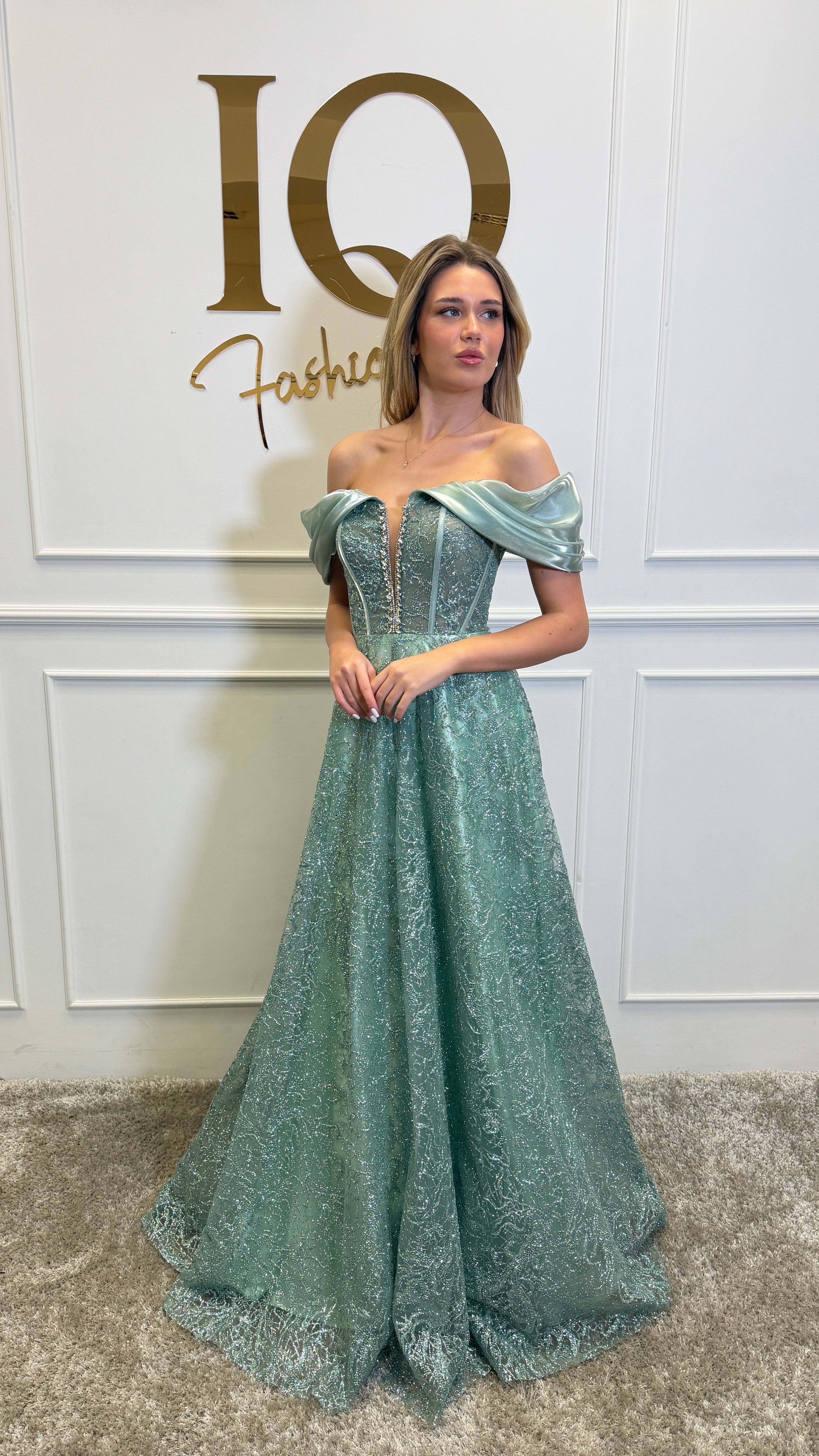 Elegant Rochie Diamond Minth by iqfashioncluj featuring intricate detailing and a stylish fit, perfect for special occasions.