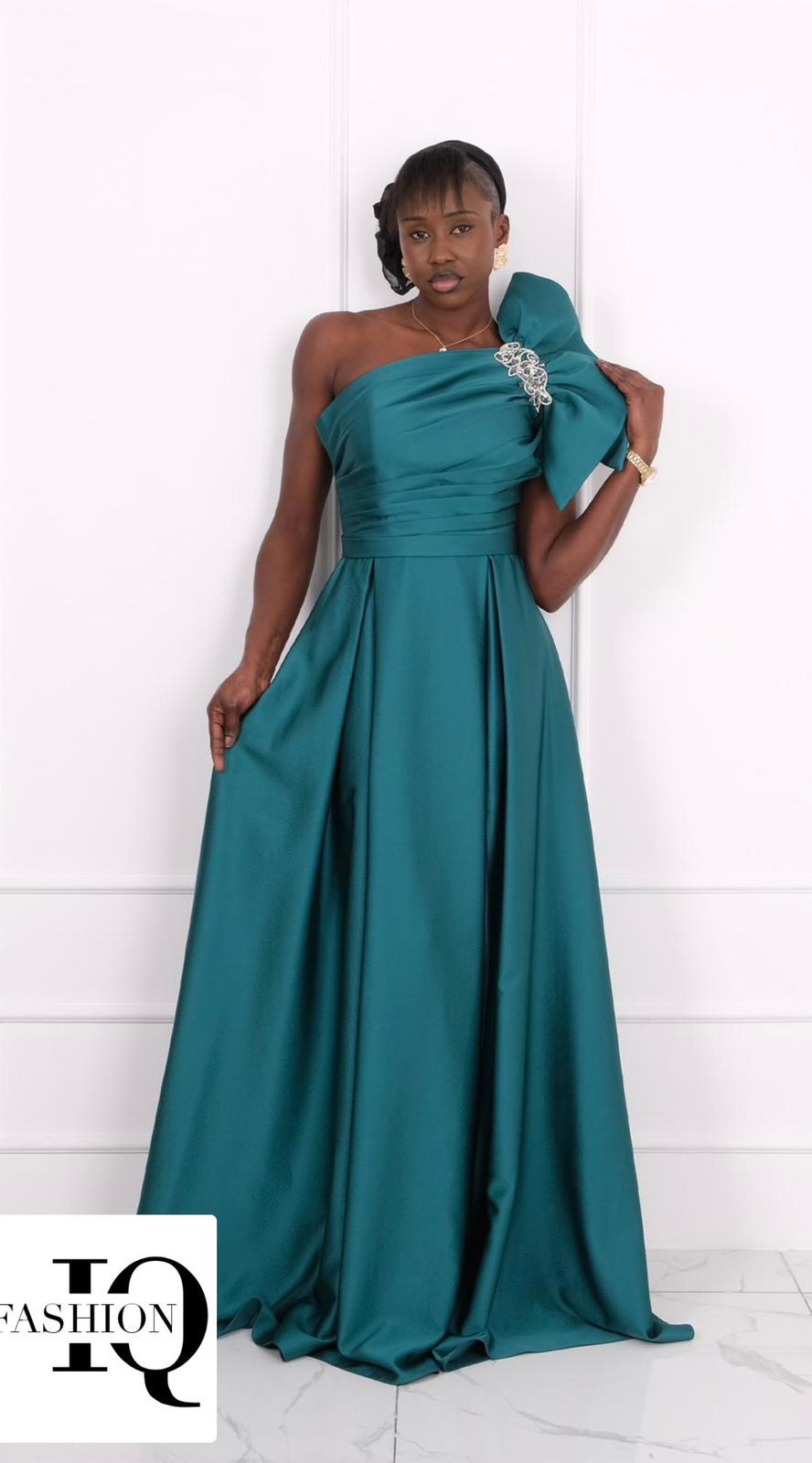 Green Rochie Rosses by iqfashioncluj, stylish women's dress with flowing fabric and elegant design, shown on a mannequin.