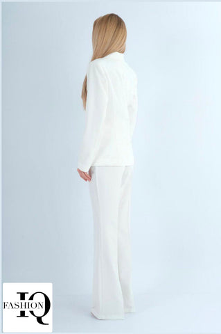 White Anais costume by ELVE STYLE SRL featuring gold button details and elegant design, shown in the image.