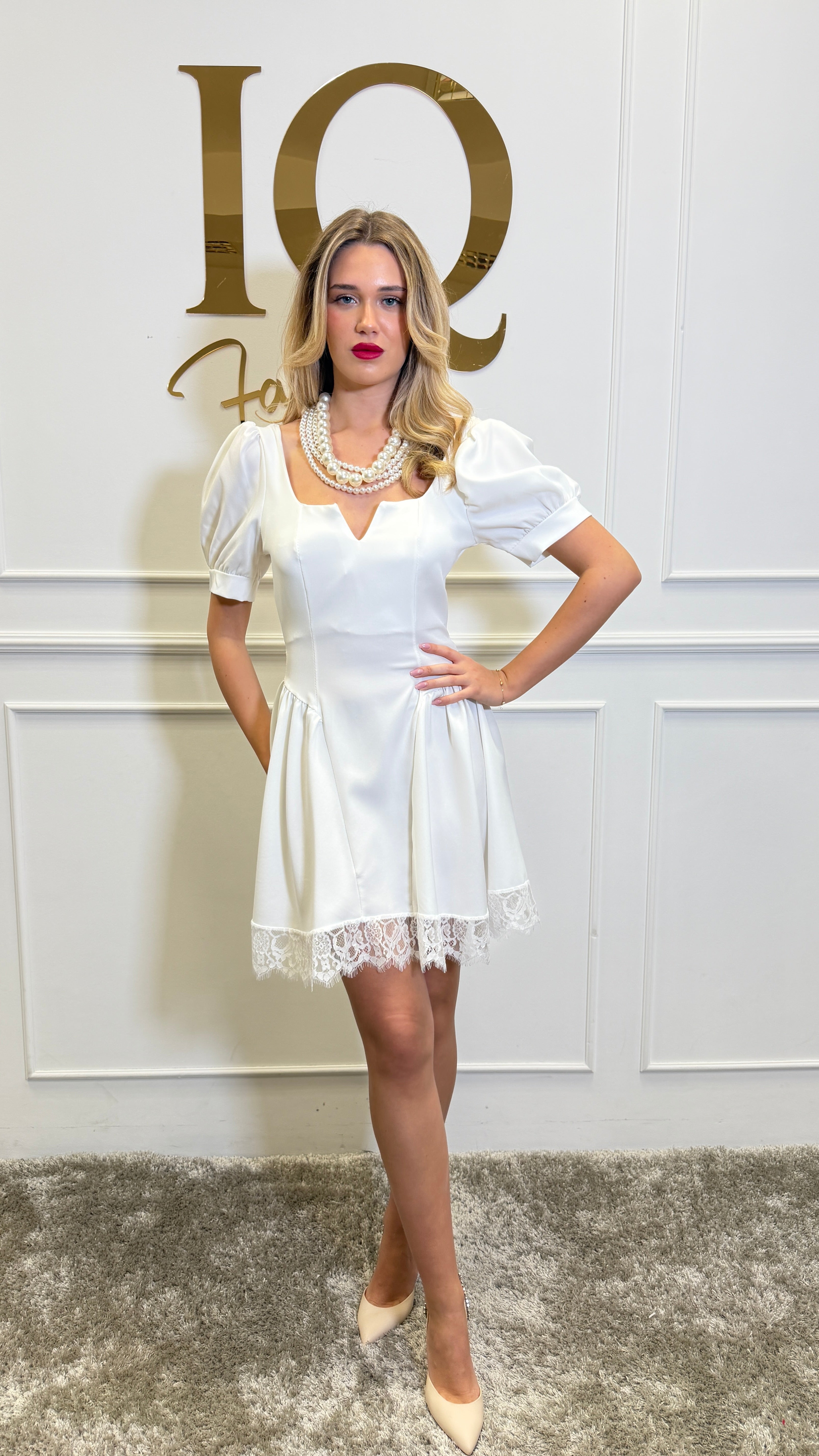White Sophya dress by iqfashioncluj, stylish women's Rochii with elegant design and flowing fabric, shown on model.