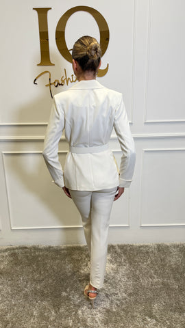 Cream Valentino costume with belt, stylish and elegant, designed by ELVE STYLE SRL, shown with detailed fabric and accessories.